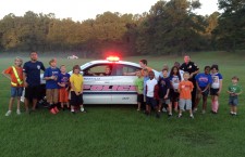 Gainesville Police Department Officers Join Hidden Oak’s Morning Milers with “Cops for a Cure” Patrol Car